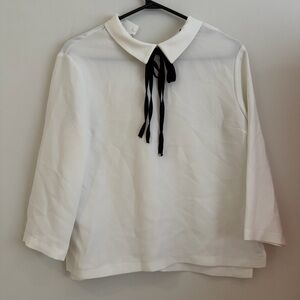 Elegant White Blouse with Black Ribbon